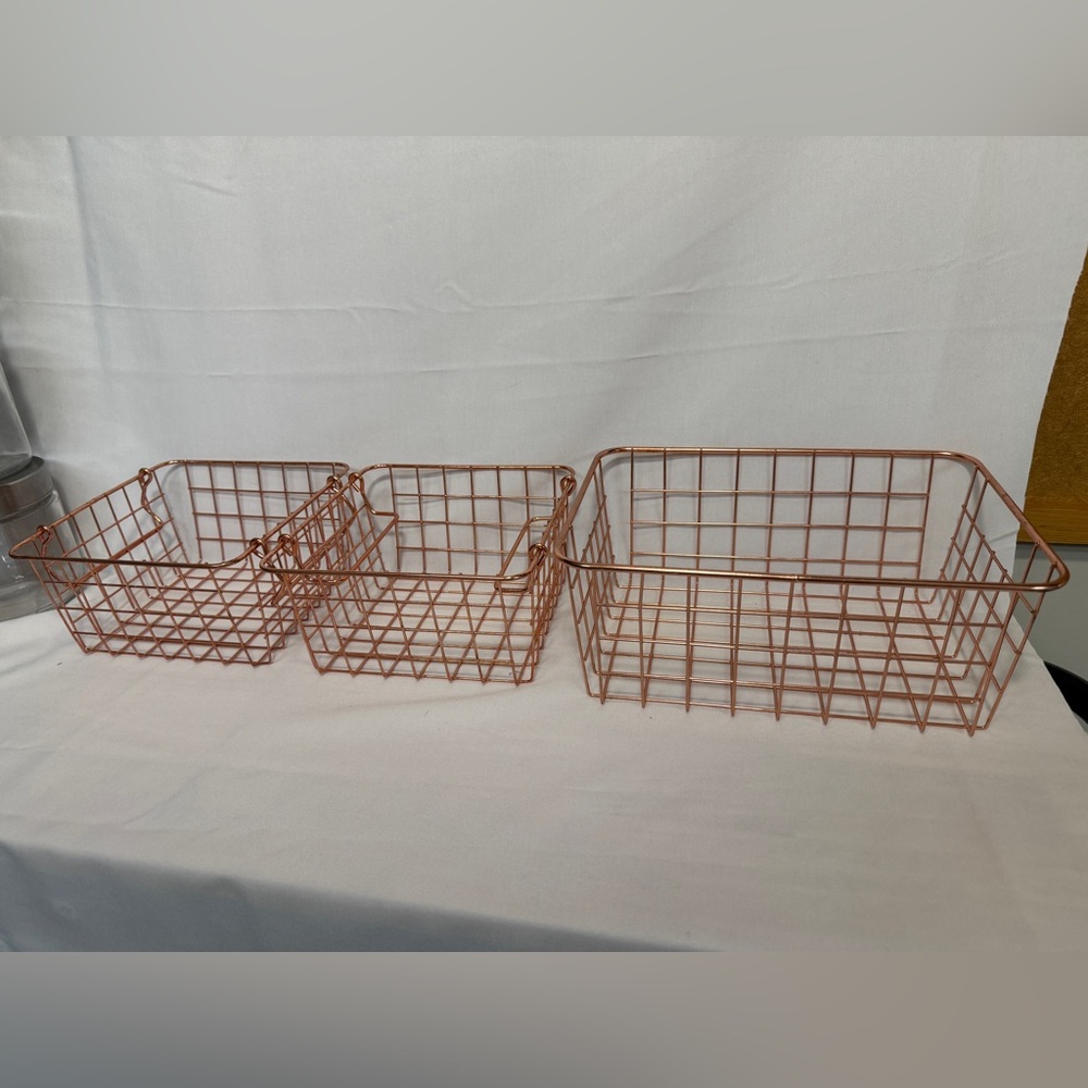 Rose gold metal wire baskets — super handy and look great anywhere.